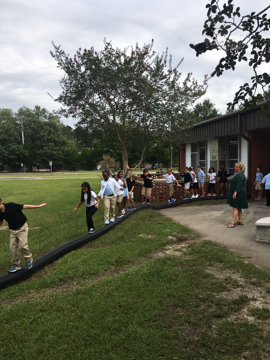 BladenCountySch's tweet photo. #bcsfirstday17 @ETPDolphins working on their balance skills. https://t.co/3kSG2ILIph