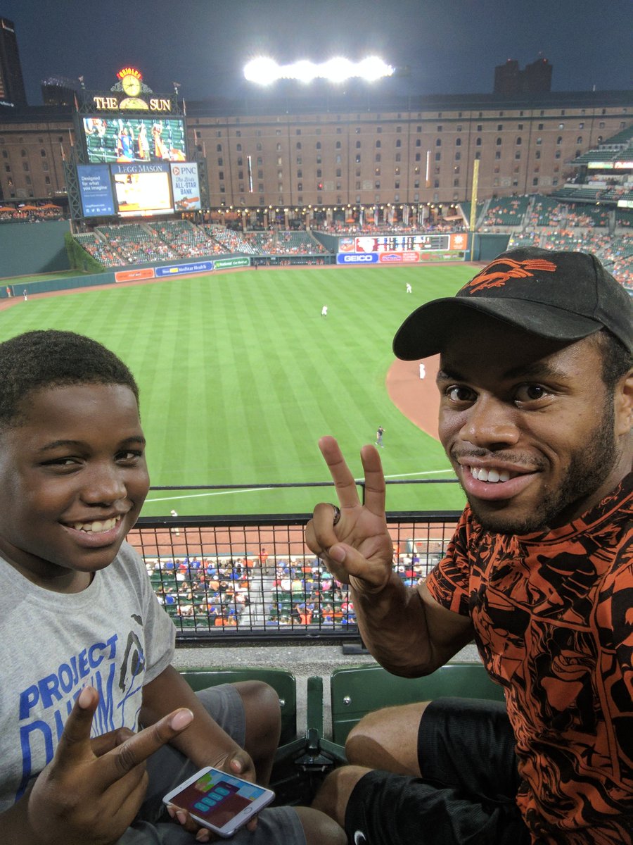 These smiles don't lie! Little Brother Deandre and Big Brother Jaishon love to hang out and catch an Orioles Game! 😃