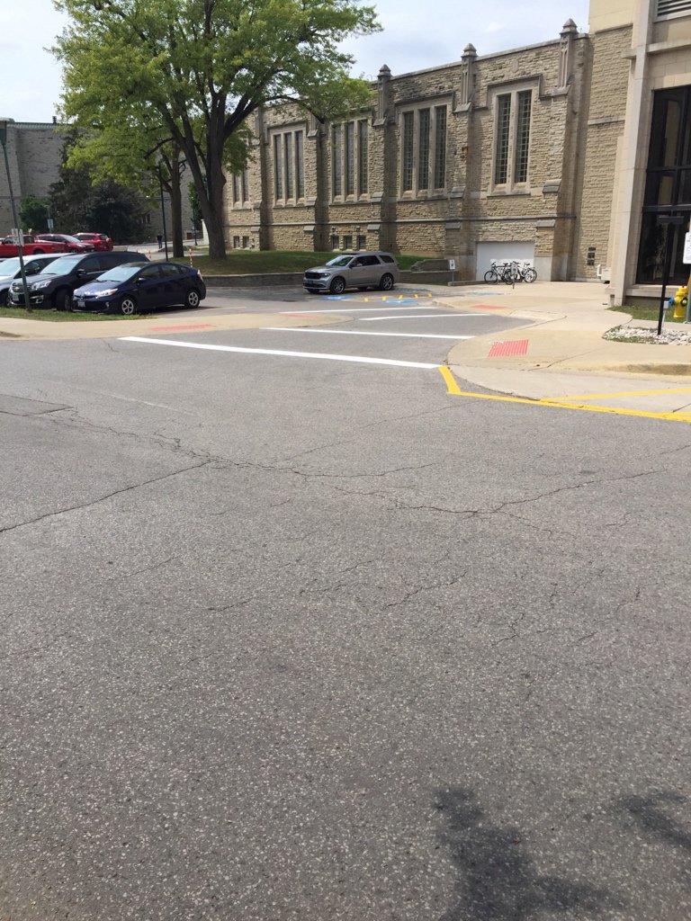 stevejev's tweet photo. @westernuFM These newly painted white lines by the 3M building are incredibly slippery with flat bottomed shoes https://t.co/UEw3Mlvizy