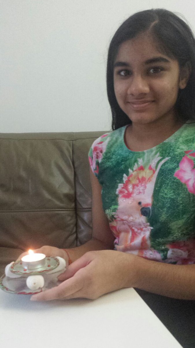 naresh5515's tweet photo. #10WeekStreak This week Shruti reused old CD's and the sea shells that she collected to make a beautiful candle stand @KHDA #Creative https://t.co/nBKJDTVQGm