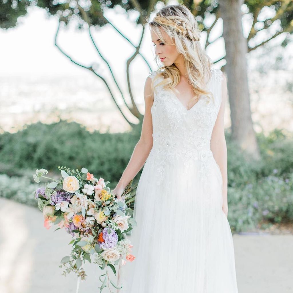 CasablancaBrida's tweet photo. The delicately beaded 3-D floral appliques on the bodice of #Style2301 Sierra will make any bride feel like the mo… https://t.co/NsDAmlPExK https://t.co/BVvf0uWvRY
