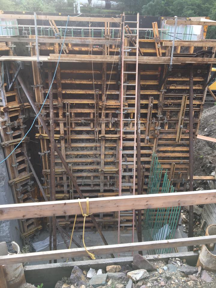 DLNHC's tweet photo. Beautiful morning on the Mansion House Bridge worksite! First of eight loads of concrete for west side abutments arriving on time. https://t.co/QQuDRx5WHw