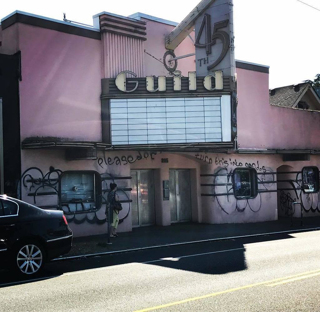 FunkCaptMax's tweet photo. Graffiti on former @landmarktheatres #Guild45th: "Please Don't Turn This Into Condos" #seattle #changingseattle https://t.co/0Qz4NNaifh https://t.co/0jXPu2ToJR