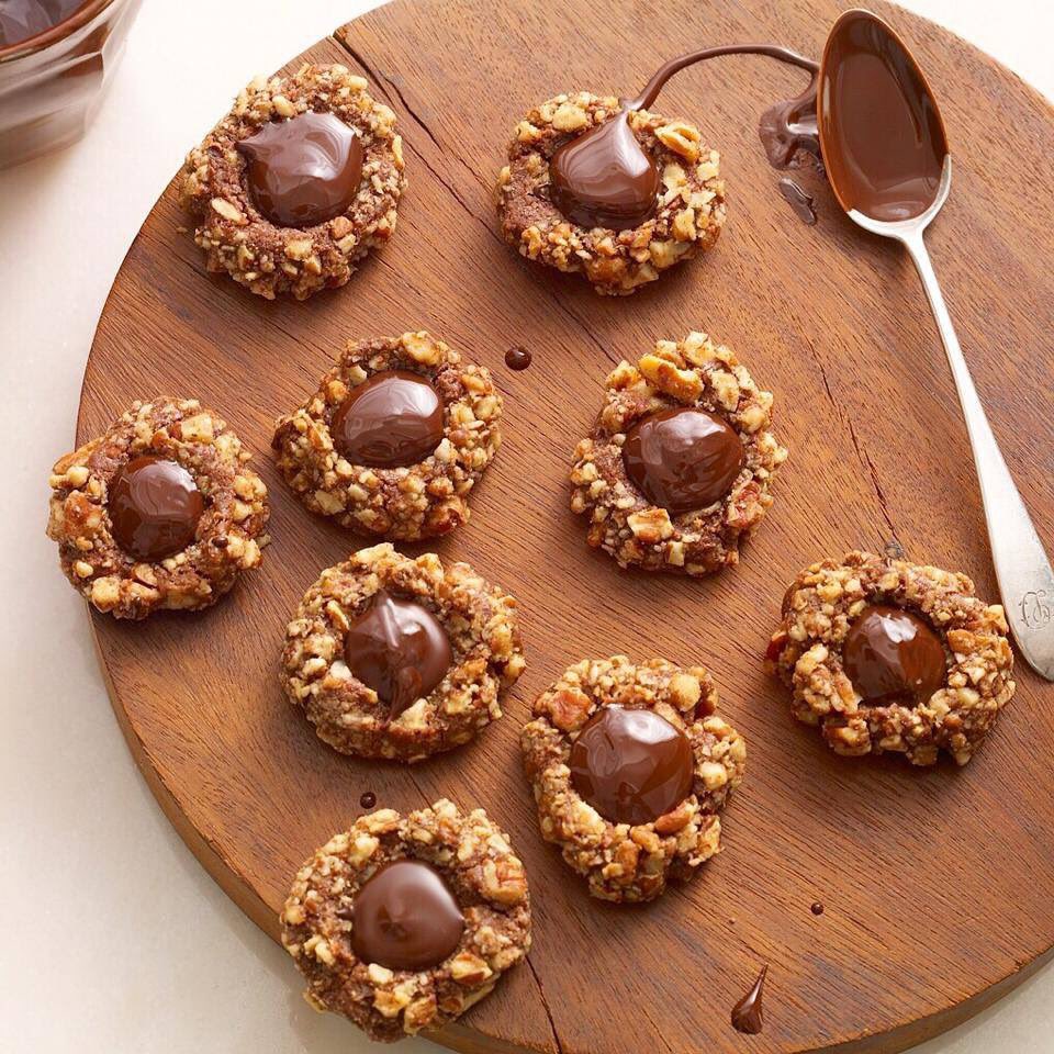 TatesBakeShop's tweet photo. Chocolate Thumb Print Cookies from the Baking for Friends cookbook. Traditionally filled w fruit jam, these are stuffed w more chocolate! 😊 https://t.co/DK1lteB8Io