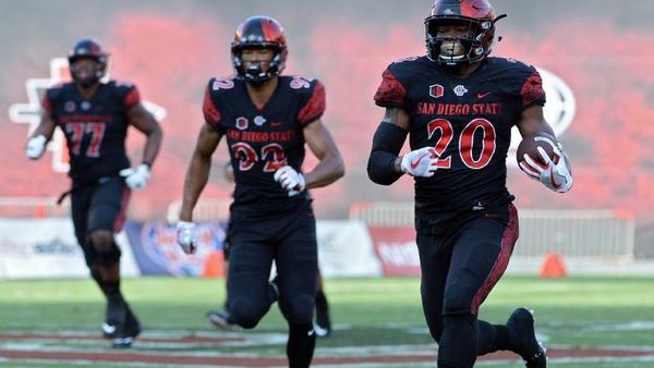sdutJenkins's tweet photo. Aztec Stadium was a knockout in red and black as State kicks off season with profound political overtones .... https://t.co/WB1Gm9UI0W https://t.co/vsrTCdvjRO