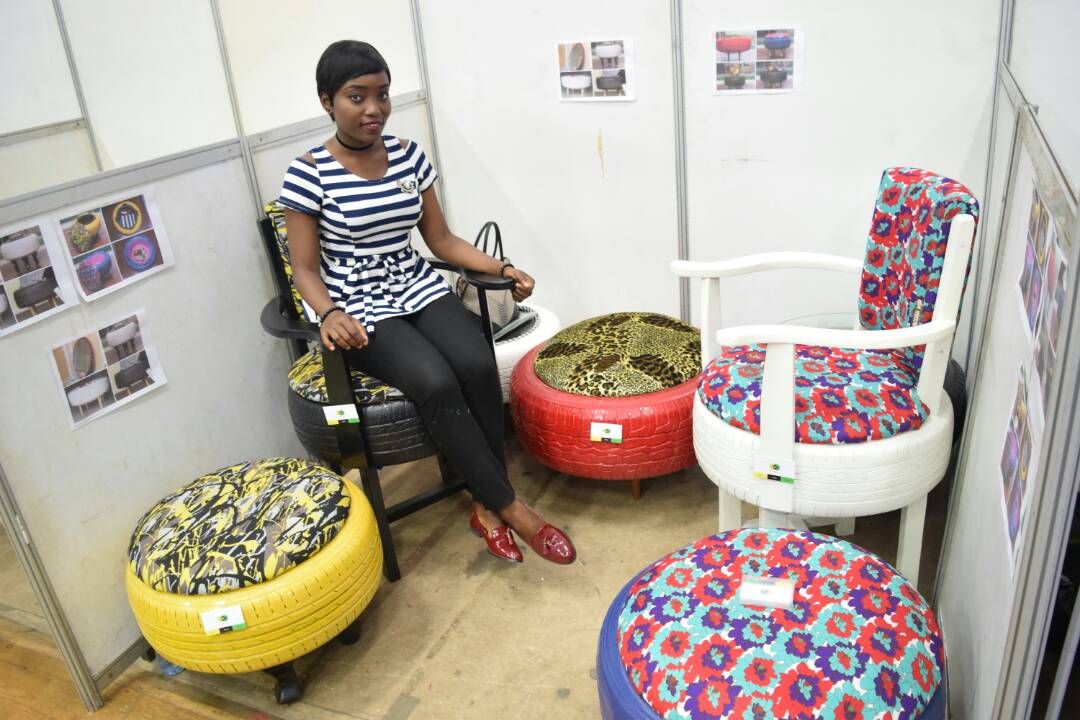 Photo of the Day: A Nigerian girl who recently exhibited pieces of furniture she created using already used tyres.