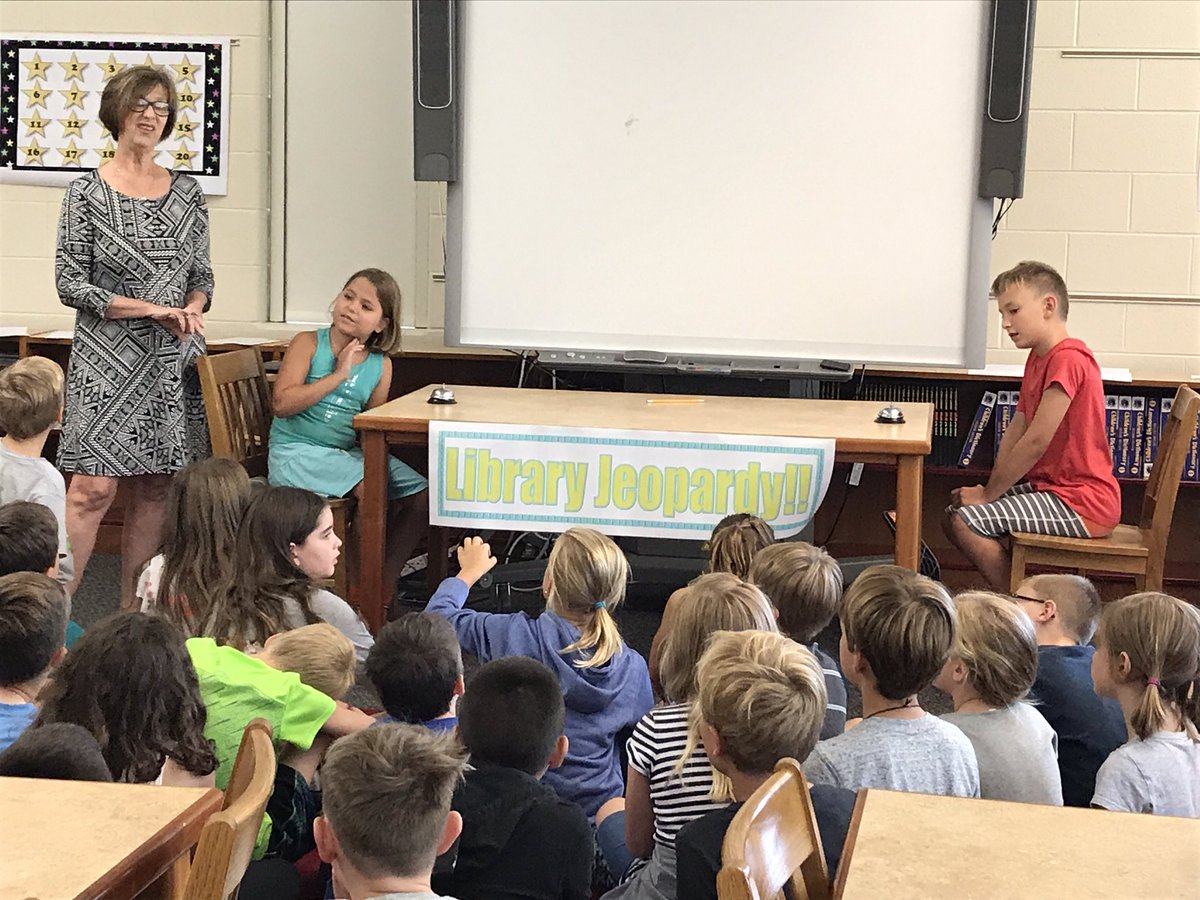 3rd grade students enjoying "Library Jeopardy" during Library Orientation with Mrs. Carlson!