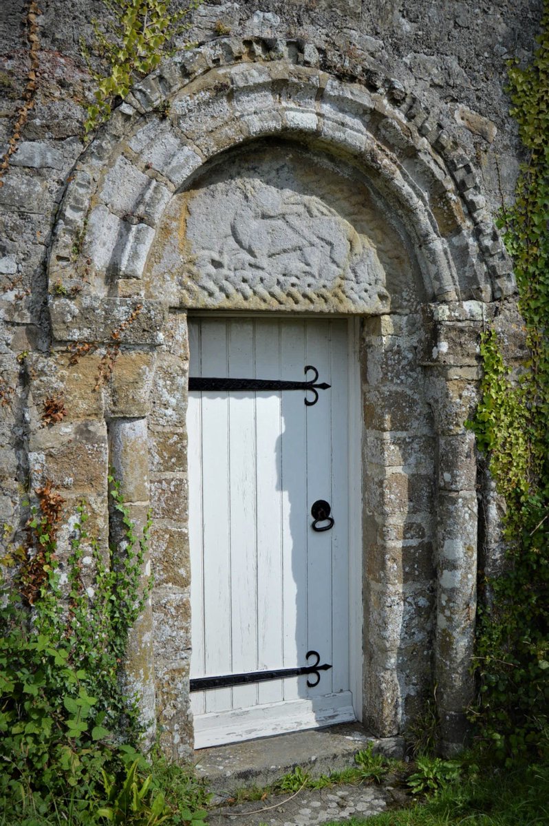 WomersleysLtd's tweet photo. Carving cica. 1150, of a fire breathing dragon over doorway of Penmon Priory.  The theme continues centuries later in The Game of Thrones. https://t.co/qh154UKkTK