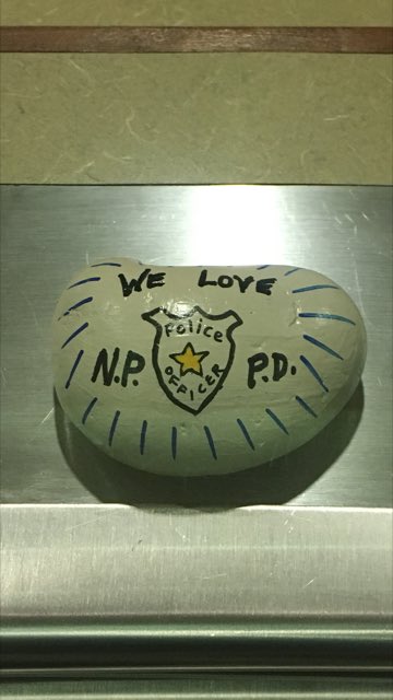 NorthPortPolice's tweet photo. The little things. This AWESOME rock was left at the communications window. Thank you North Port for the support. #nprocks https://t.co/C8iJxJNH22