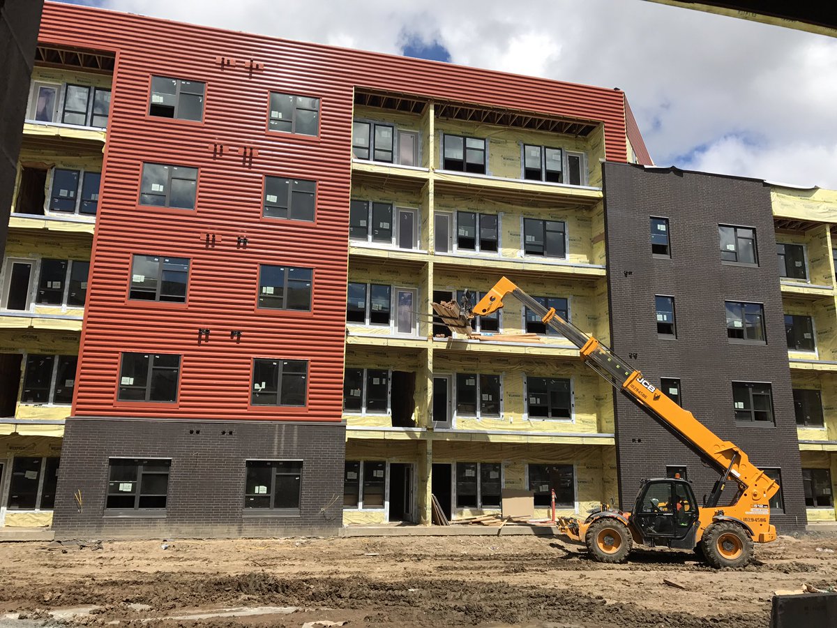 jamestindy's tweet photo. Only the blue siding is easily visible from I-35 so far at Crossroads Westside, but the rust color in the courtyards is terrific as well! https://t.co/WwpWCxUefb