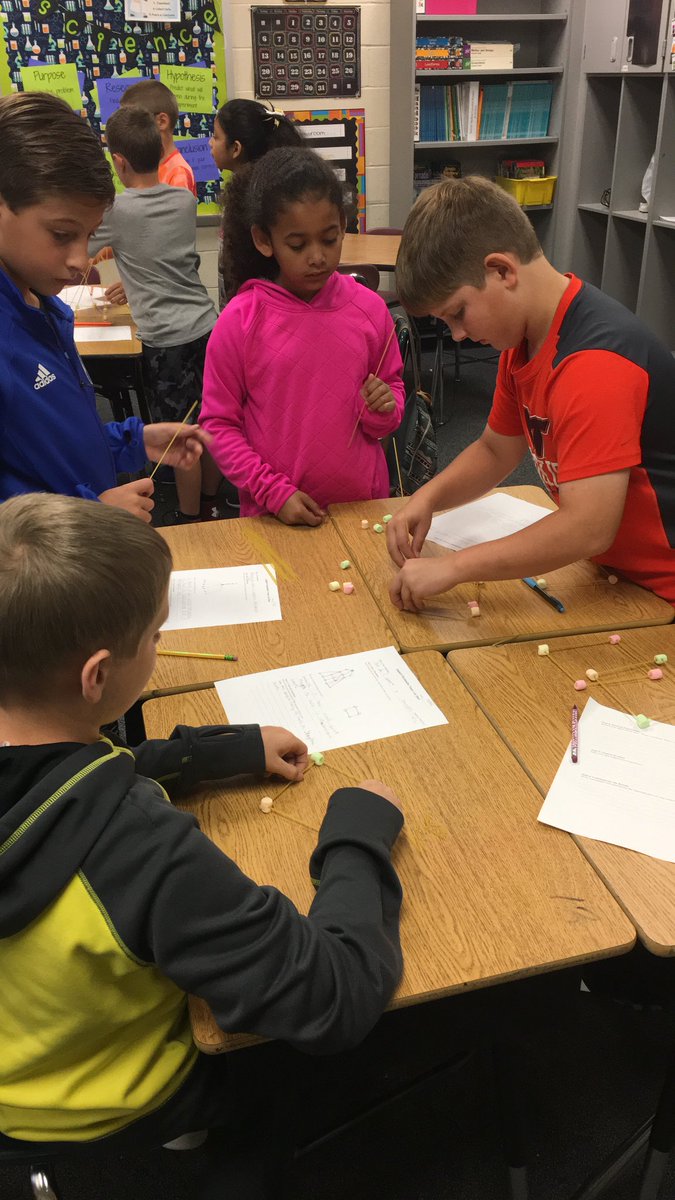 Building towers out of spaghetti and marshmallows! We had some creative ideas!