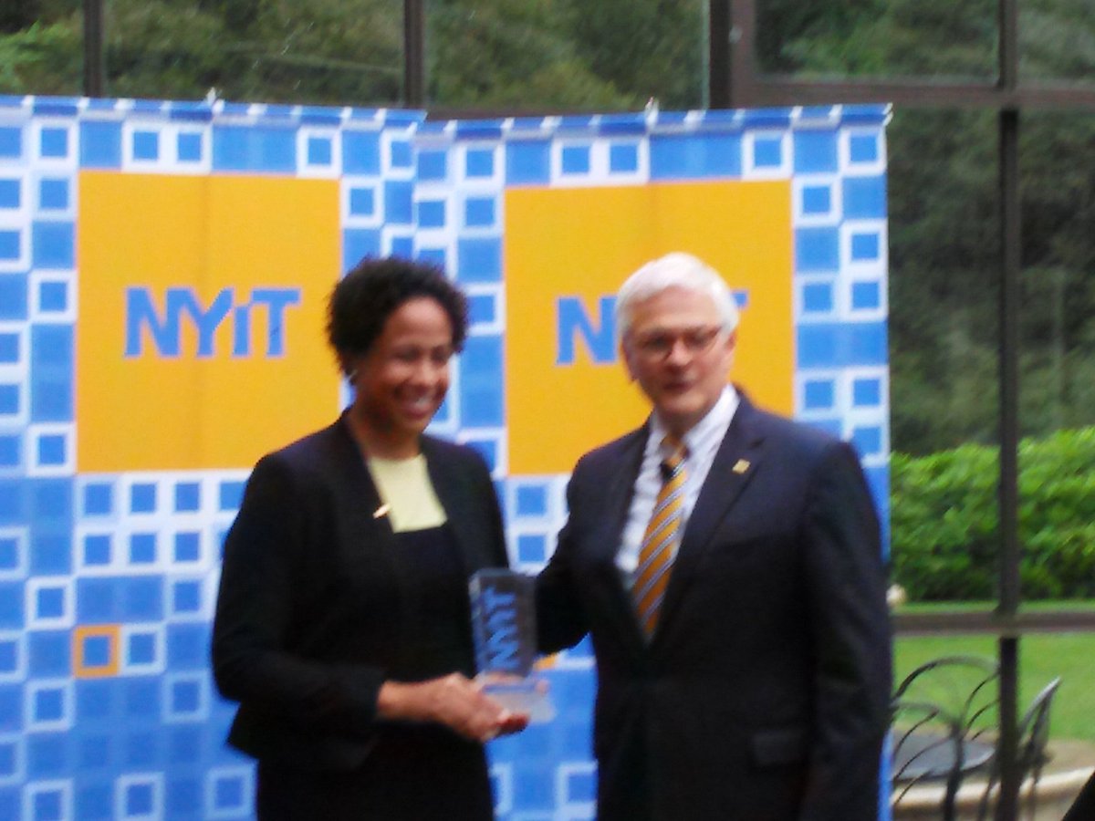 kmbelnap's tweet photo. Hank Foley, president of #NYIT, with Presidential Engagement Award Winner @DrGabysVoice. https://t.co/8UskofHmBd