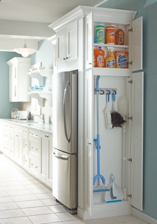 marcymckenna's tweet photo. Love this! A great solution - a cupboard on the side of the fridge for all your cleaning supplies. #SimplySolved #getorganized #clutterfree https://t.co/RhteQYH4Fx