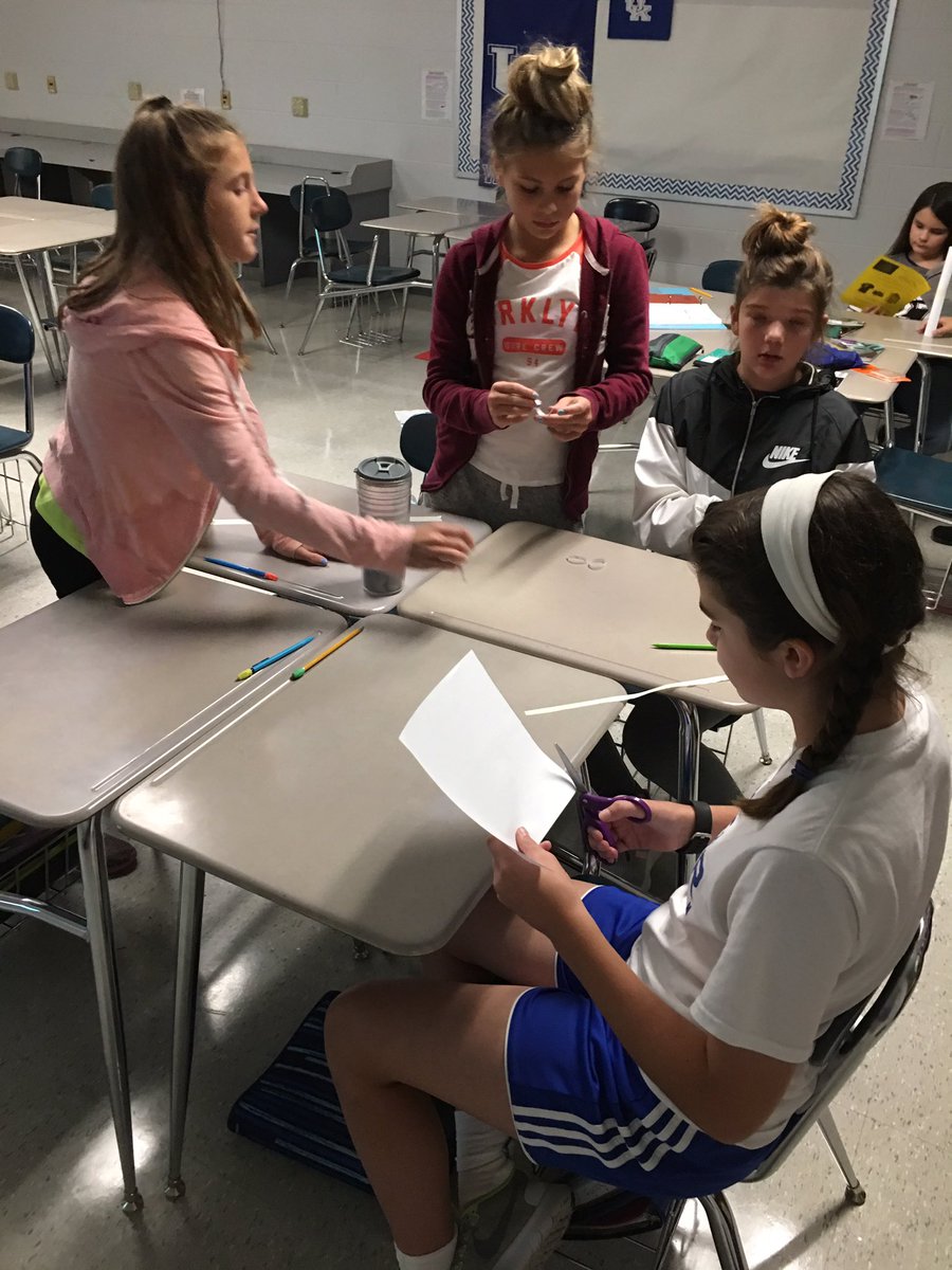 We're trying to build a freestanding tower using only a sheet of paper and meter of masking tape #GeniusHour #SVARoyals