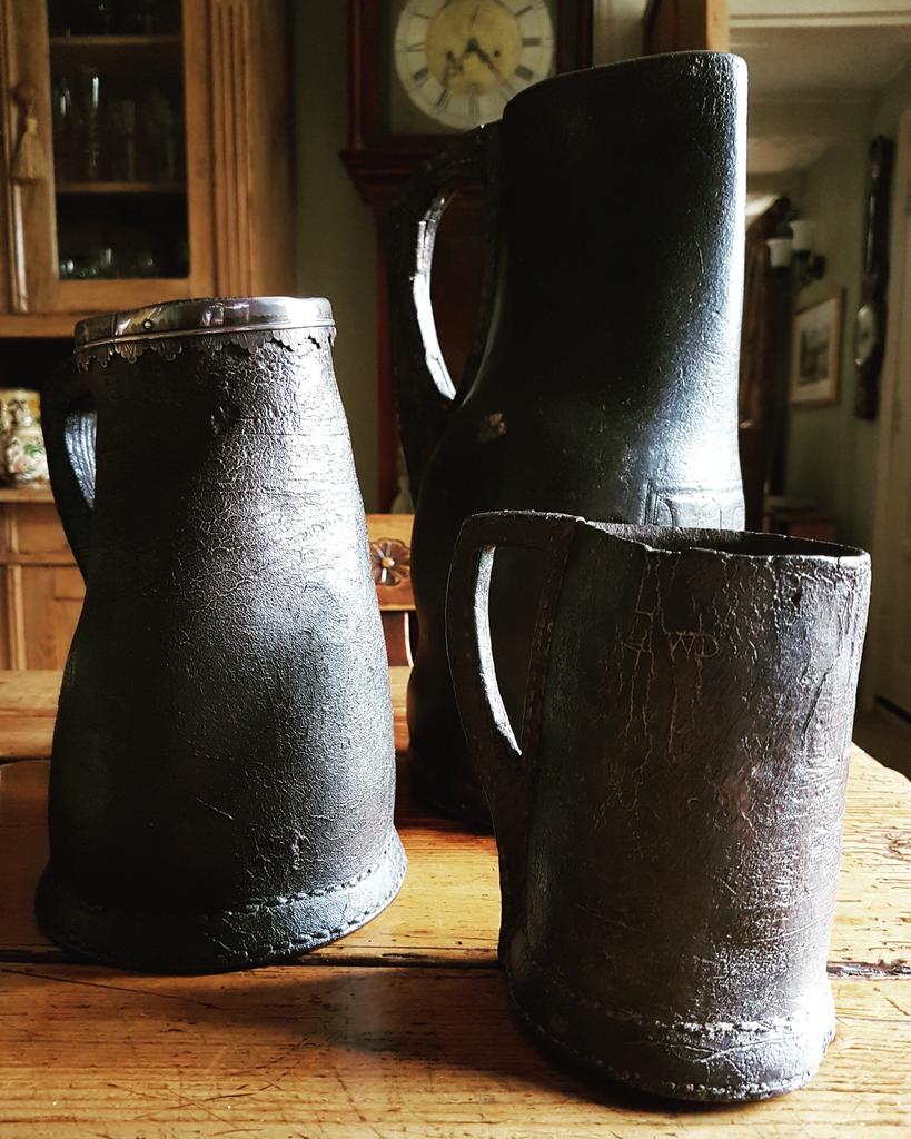 HoltAntiquesLtd's tweet photo. #antiqueleather #blackjack + 2 #leather #bombards. All #17thCentury #english #antiques. From my own collection 2! Keepers at present! https://t.co/b2zmMvzv7C
