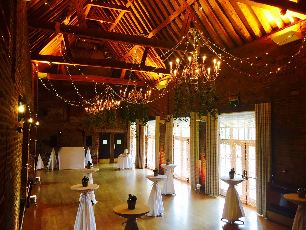 FortyHallBanq's tweet photo. Our favourite set up so far!  Ivy from chandeliers and fairy lights! Tables for our bowl food! 🍚🍵 #WeddingReception #Enfield #FortyHall https://t.co/J1KPVMW3qS