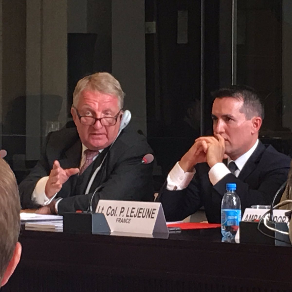 johnismay's tweet photo. Amnesty's Ben Walsby presses for release of data (location &amp; munition used) post-strike. Amb Bontino of Germany (L) expressed support #EWPA https://t.co/s3BZChhXIC