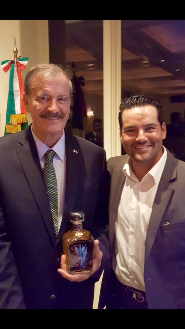 Carlos presents #caostequila to Mexico's former President Vicente Fox
