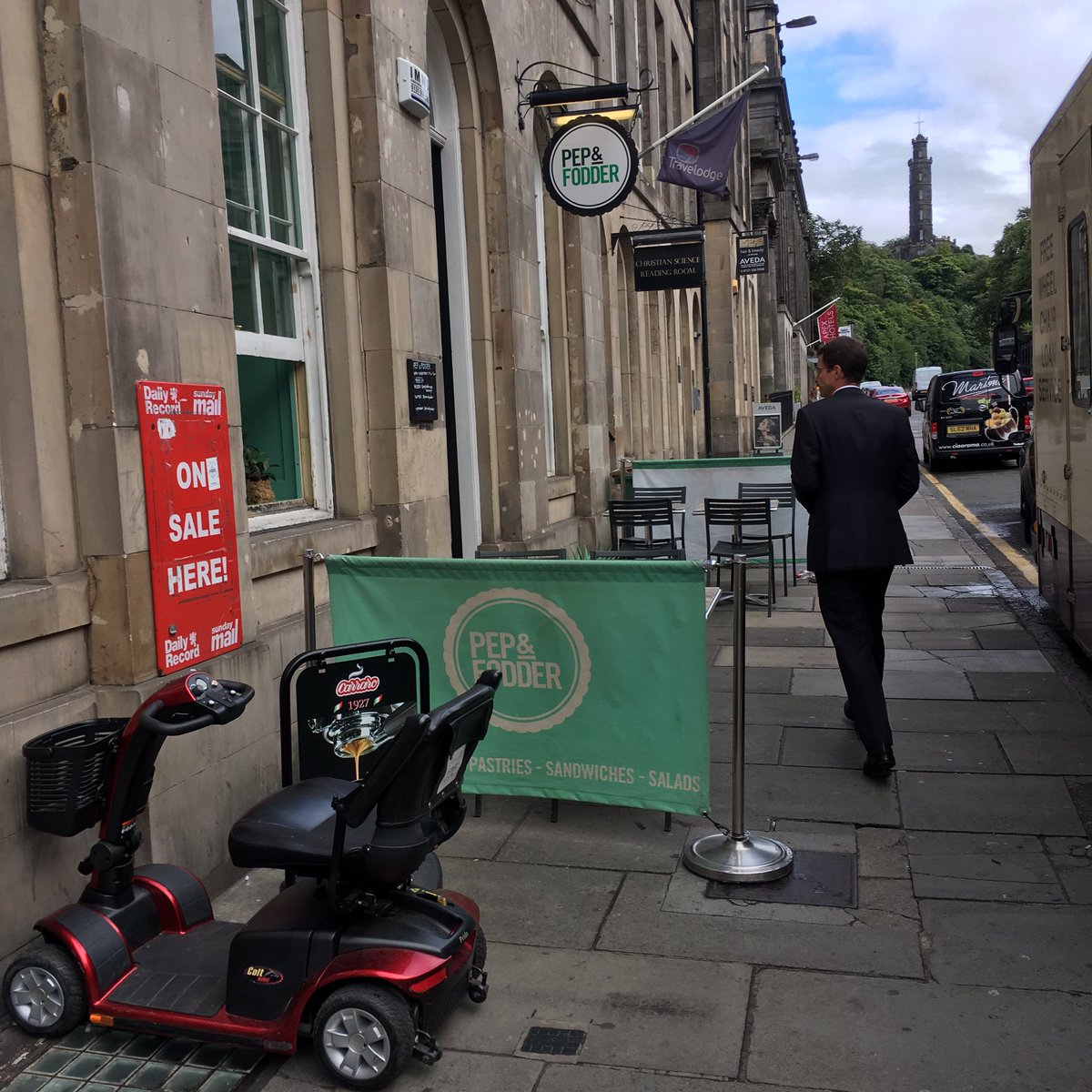 StreetWurrier's tweet photo. Shop mobility becomes stopped mobility on Edinburgh's cluttered pavements thanks to poor #streetmanagement https://t.co/exu2OPVUtI