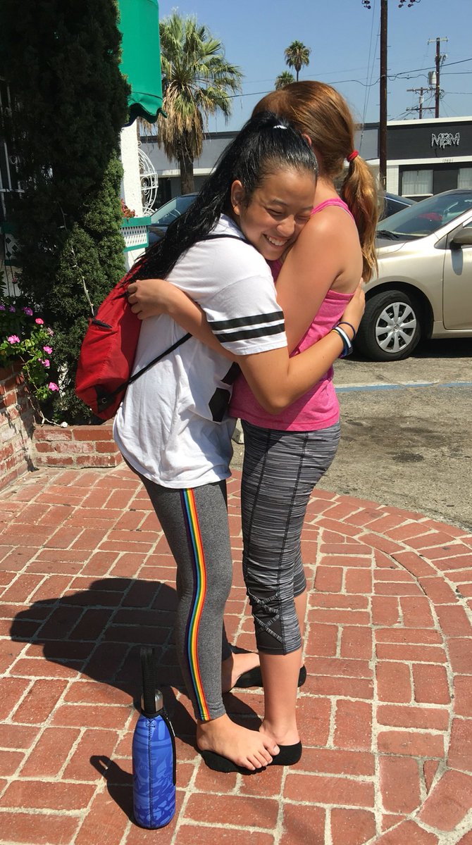 Happiness is...sisterhood at its best...<a href="/saycurda/">Saylor Curda</a> saving <a href="/GloryCurda/">glory grace curda</a> 's barefeet from🔥 hot concrete😊 #sisterlove