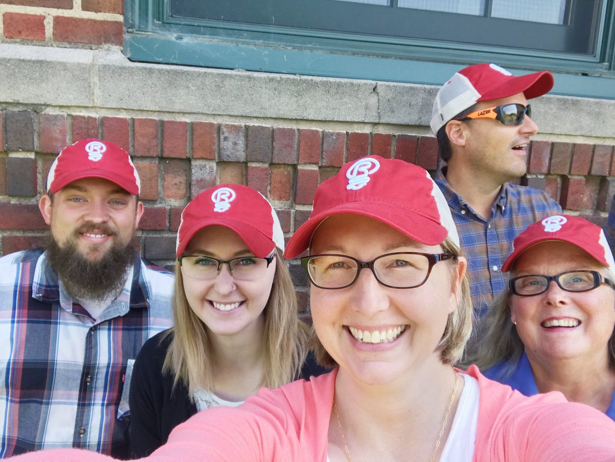 Strateligent's tweet photo. We couldn't wait for Nat'l Hat Day to show off our new RHM hats. (And the guy in back: "Squirrel?!") #powerfulcommunication #RedHouseMedia https://t.co/79tfH3hylI