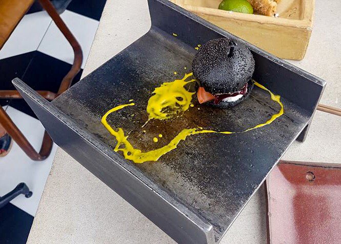 VACANCY: Waiter required to carry burgers on Reinforced Steel Joints.
£8 per hour.
No sick leave for back problems.

(Pic: Jon Russell)