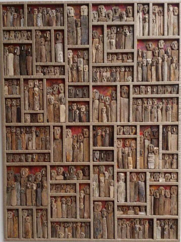 Mark Bourlier using wood paper and paint created this almost scary piece of art.  It's wonderful, well I think so