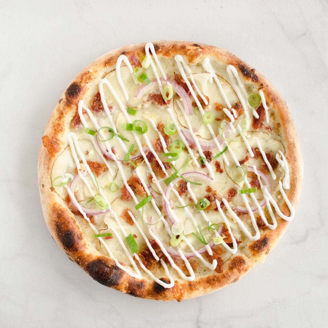 Introducing our new Loaded Baked Potato Pie! All the deliciousness of a loaded baked potato on a pizza :D Ideal for a rainy day like today!