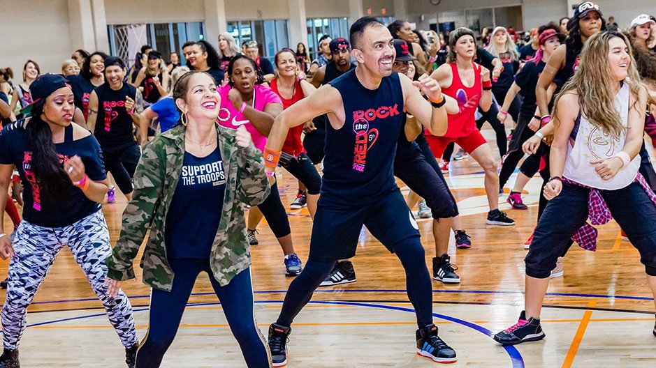 We loved being the “splash of pink” at “Rock the Red with a Splash of Pink". Participants had fun &amp; made a difference for #HelpingWomenNow.