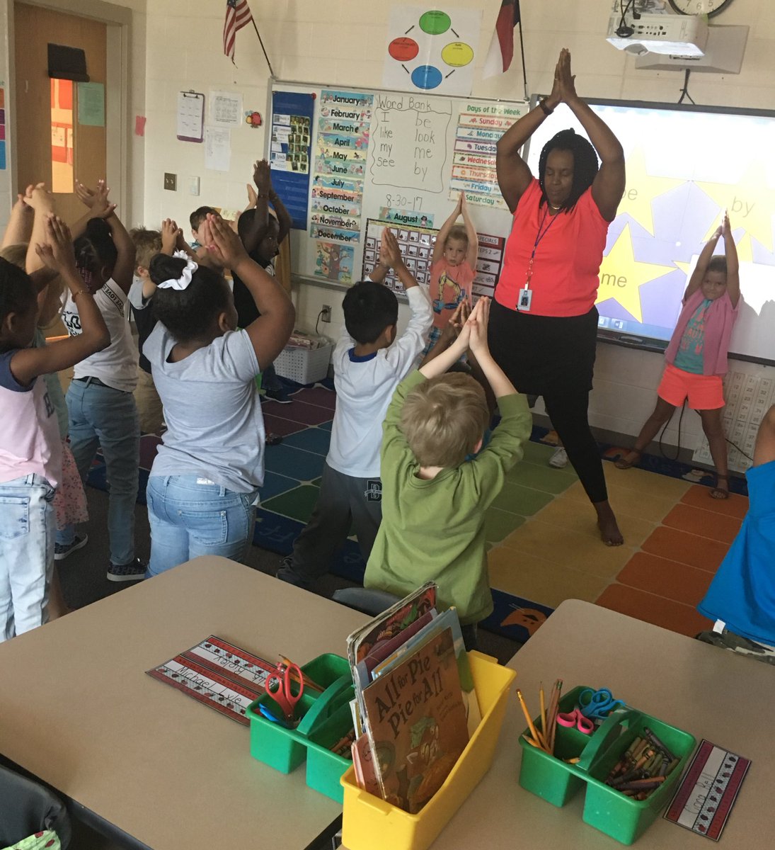 TraceyLipkins's tweet photo. Yoga time during morning meeting with my TA Mrs. Robinson!! https://t.co/7bPhxStuMO