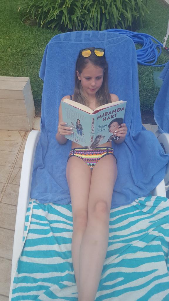 JulieParr8's tweet photo. @mermhart my 12 year old daughter on her holidays loving your book. Missing our dog tho...Connie the Cockapoo. A retweet would cheer us up!! https://t.co/on7PZ8IqBZ