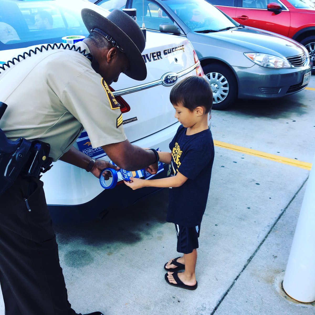HanoverSheriff's tweet photo. This young man made a donation as well.....@SOlympicsVA #torchrunva @Wawa https://t.co/HrZhQiZGJA