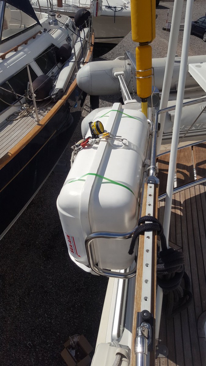 LIFEGEAR3's tweet photo. Liferaft, cradle and HRU fitted onto a Nauticat 42 today, ready for its trip back to Scotland. https://t.co/UKvlDv5Igm