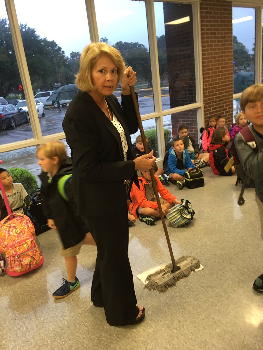 WS_Generals's tweet photo. Dr. Johnson making sure the floors are not slippery on a REALLY rainy morning! https://t.co/EHPNEEh6kA