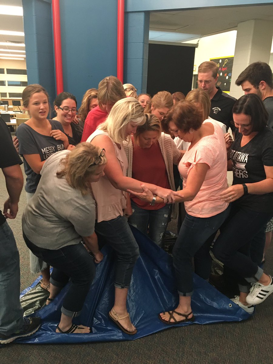 Teachers working together to flip the tarp! #growthmindset #nh2017