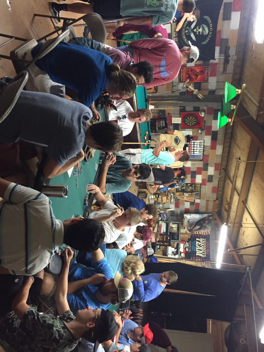 ATOUNCW's tweet photo. Tonight was traditional ATΩ cigar and poker night. Brothers gather at Brookelynn Cigars to bond over a few rounds of poker and billiards. https://t.co/Zc5R71srtW
