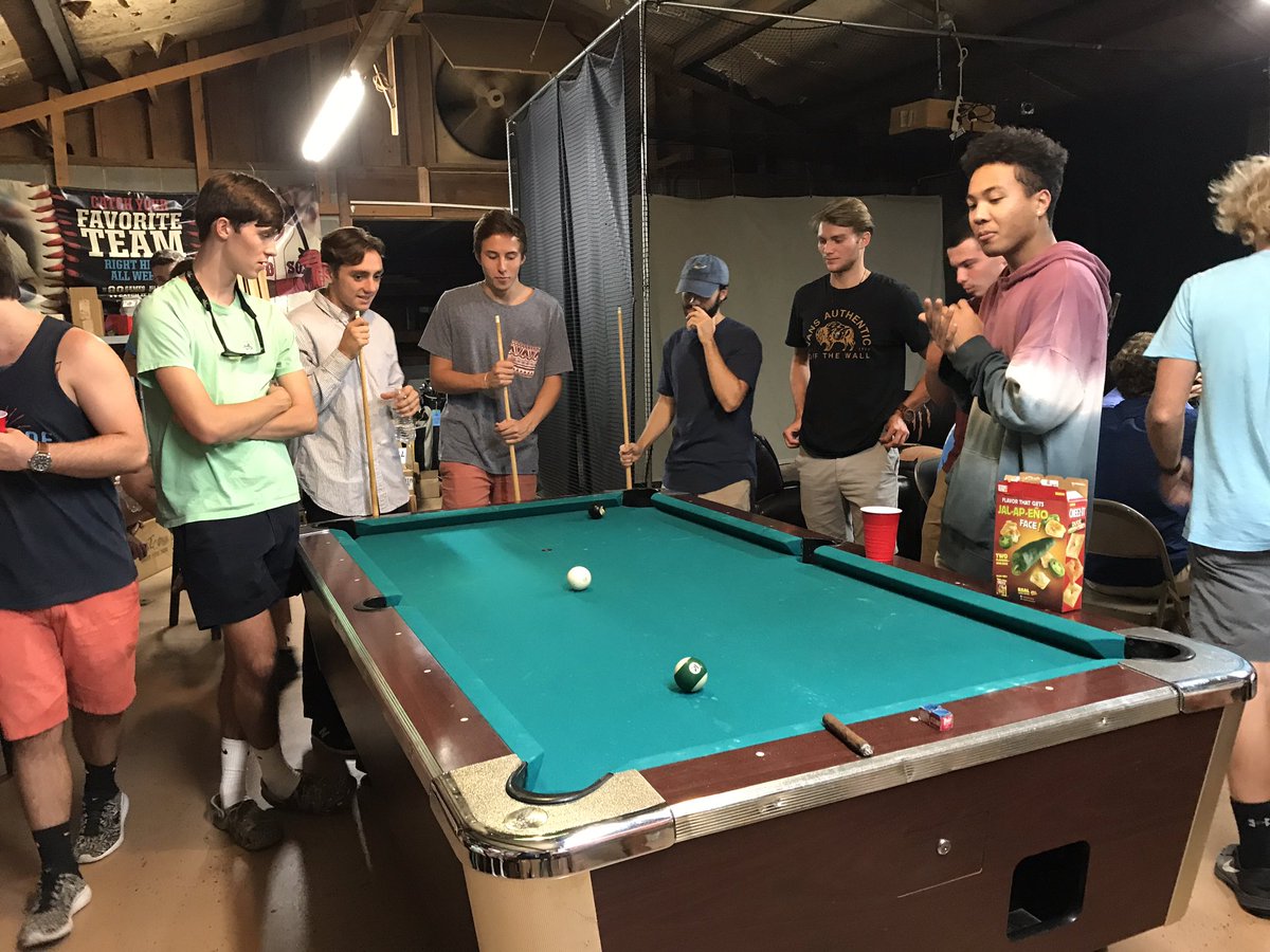 Tonight was traditional ATΩ cigar and poker night. Brothers gather at Brookelynn Cigars to bond over a few rounds of poker and billiards.