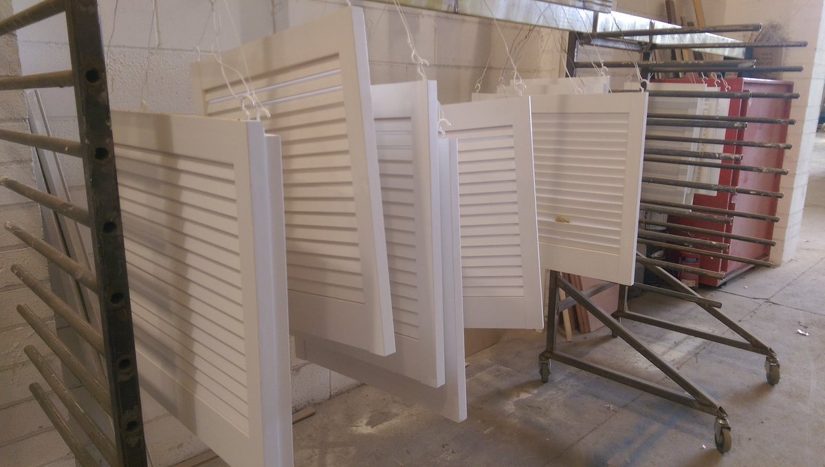 Louvre doors. Hundreds of them!  All sprayed white for a very good customer of RJB.