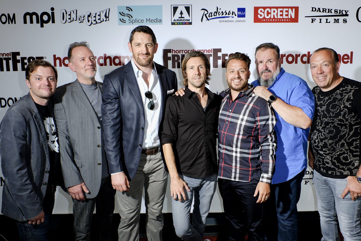 Here's the lovely <a href="/FangedUpMovie/">Fanged Up</a> team on the @frightfest media wall. Loving the top <a href="/TerryStone/">Terry Stone</a> and what has Richard Turner spotted?