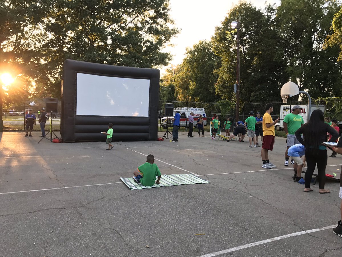 LowellPD's tweet photo. We're setting up right now for our Summer Safety Movie night. Don't forget your blankets & chairs. #LPDSafeSummer https://t.co/VZLXHON9af