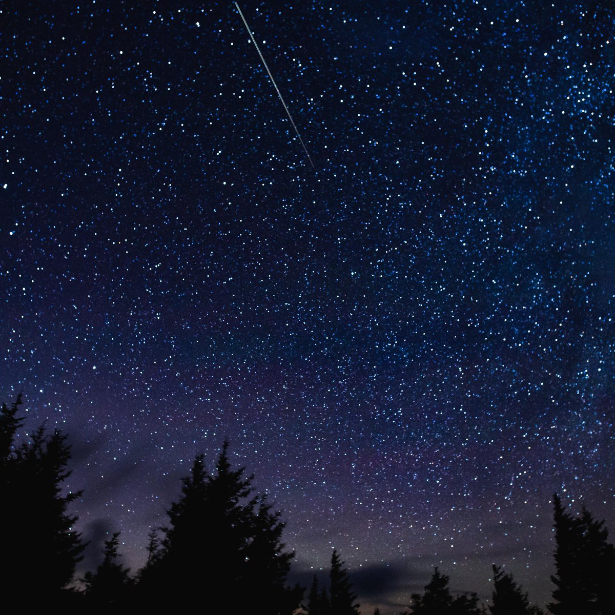 Discovery's tweet photo. Photo of the Day: In this 30 second exposure, a meteor streaks across the sky. Thanks to @NASA for this photo! https://t.co/rDuRTp0JMD