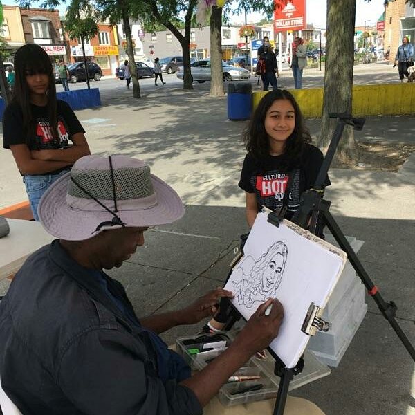 EastEndArtsTO's tweet photo. @SarvenazRayati @chuckwhat Portrait workshop & caricature drawings are underway until 6pm. Join us at the #MainSquared festival at Main & Danforth! #CulturalHotspot https://t.co/r1fIlAq5hG