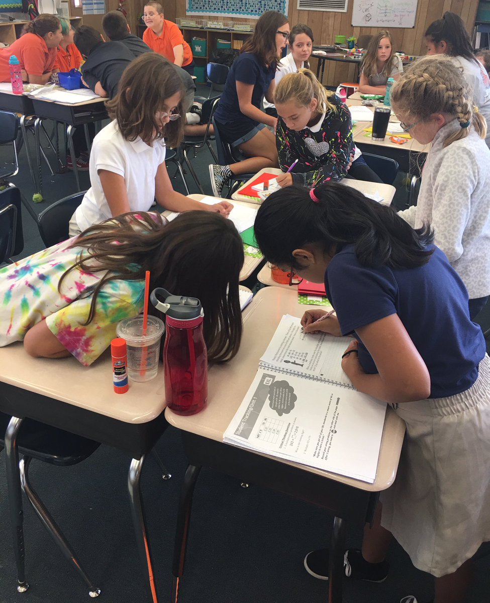 EmilyFagerstrom's tweet photo. Heads together, butts up! Student collaboration at its finest today for multiplication strategies. #positivelyPortOrange #believein180 https://t.co/AdwhJW7yVQ