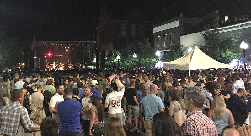 LJWorld's tweet photo. The 1000 block of Mass Street will close Friday for a free pep rally and concert to kick off the #kufball season https://t.co/epeI2wRxpK https://t.co/LMXXu2Fncu
