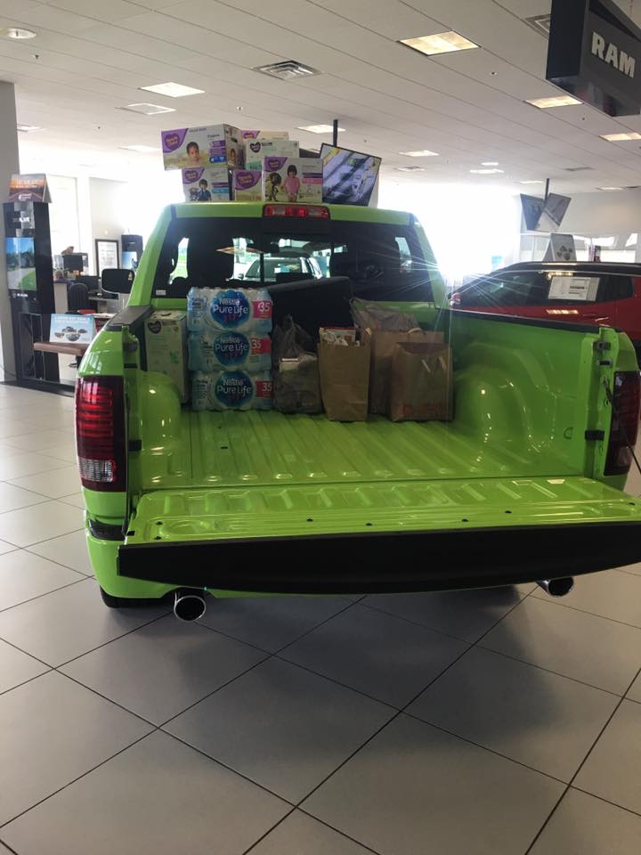 CDKGlobal's tweet photo. @McKinneyDodge is collecting donations and sending this @Dodge Ram truck to Houston. #DealerStrong https://t.co/tYJUZTxTBq