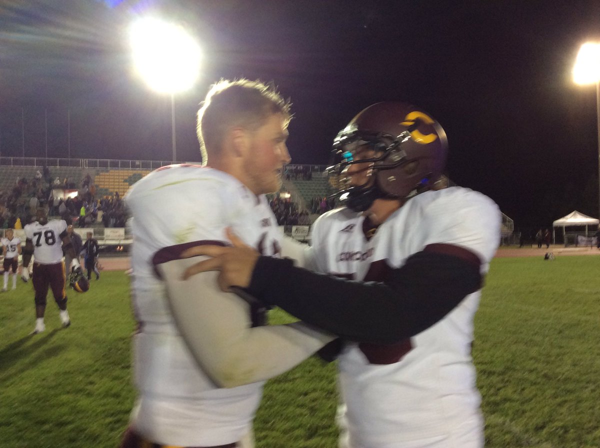 QB Trenton Miller congratulates Andrew Stevens on the game winning field goal.