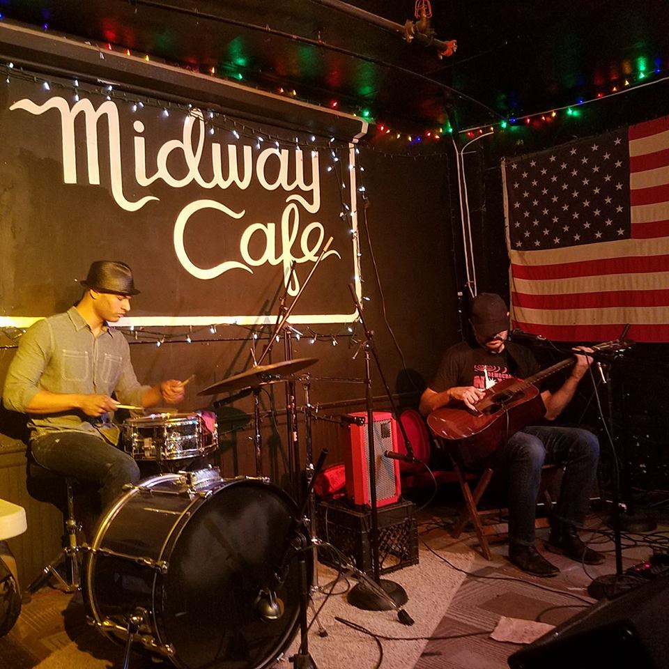 Queeraoke's tweet photo. #DeteoitRiot on stage rockin' it out right now pre-Queeraoke at Midway Cafe! #CoolLocalBands https://t.co/zZJrcY5zzS https://t.co/mOjmI6VkNL