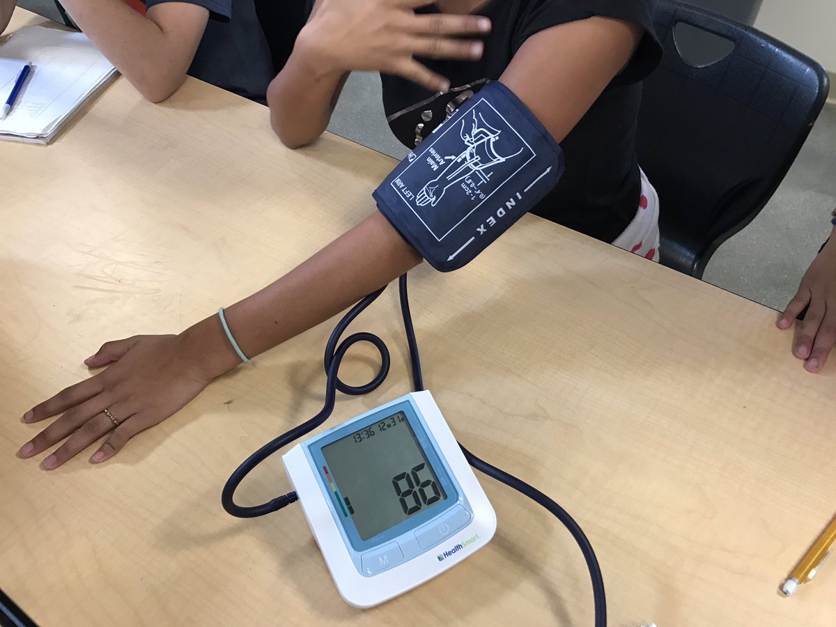 KernStem's tweet photo. Students learning how to take blood pressure, and what blood pressure means. #PLTW #medicaldetectives https://t.co/WmhpspoIva