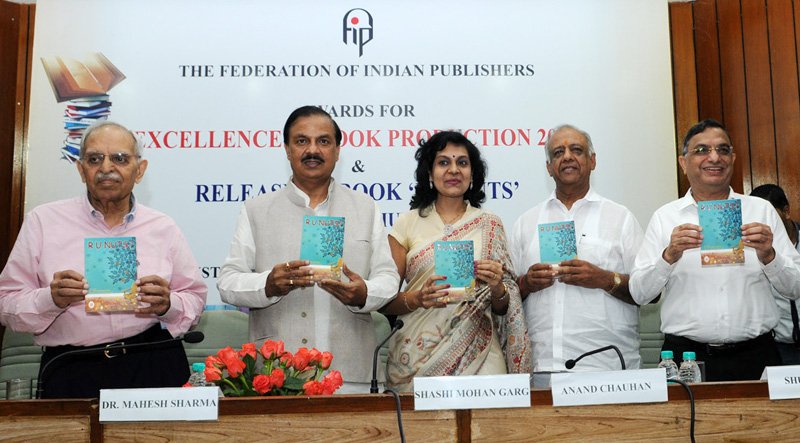 PIB_India's tweet photo. Union Minister @dr_maheshsharma releases book ‘R U NUTS’, at #DelhiBookFair, in New Delhi https://t.co/zeEegy7Kea