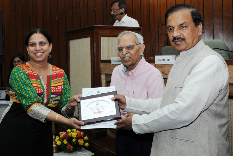 PIB_India's tweet photo. Union Minister @dr_maheshsharma presents awards for excellence in book production, at #DelhiBookFair, in New Delhi https://t.co/xewzmuRStm